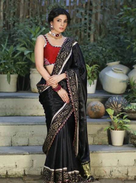 BLACK MODAL SILK SAREE WITH GOLDEN BORDER HIGHLIGHTED WITH LACE