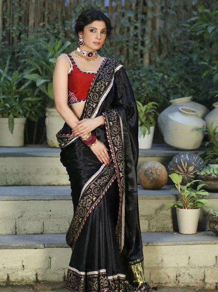 BLACK MODAL SILK SAREE WITH GOLDEN BORDER HIGHLIGHTED WITH LACE