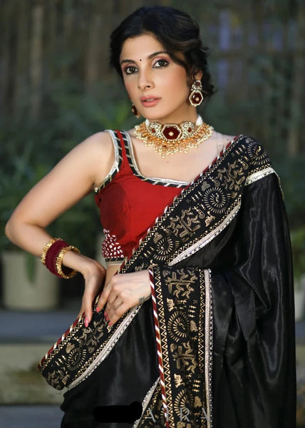 BLACK MODAL SILK SAREE WITH GOLDEN BORDER HIGHLIGHTED WITH LACE