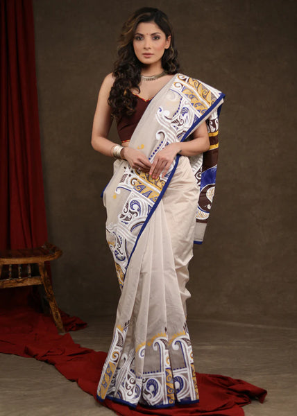 CREAM CHANDERI SAREE WITH EXCLUSIVE ALPANA HANDPAINITING & BLUE BORDER