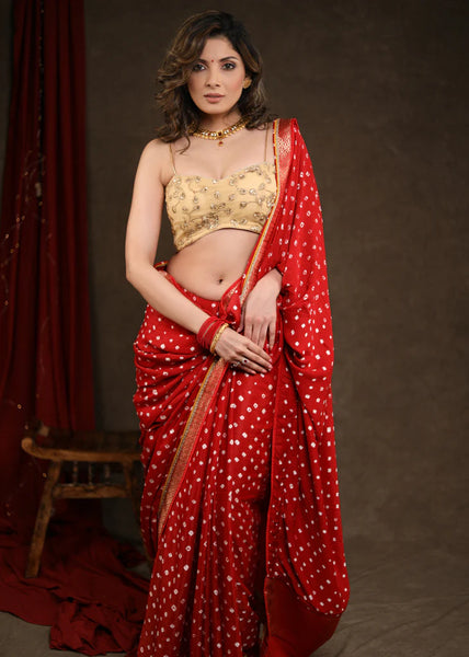 RED BANDHEJ SAREE WITH DELICATE GOLD AND BANARASI DETAILING