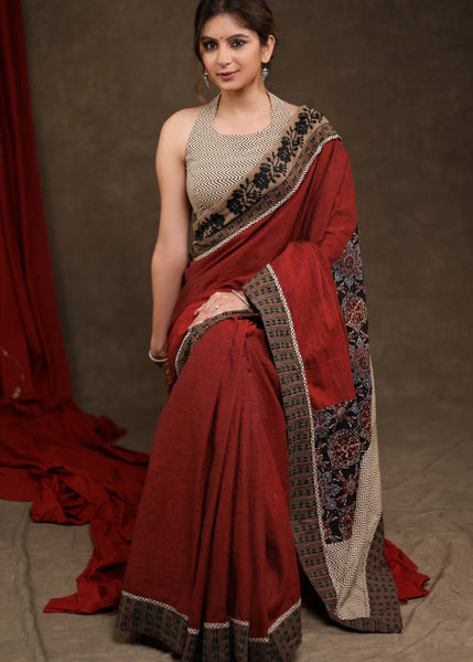 MAROON COTTON AJRAKH COMBINATION SAREE HIGHLIGHTED WITH FLORAL EMBROIDERY