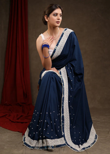 OCEAN BLUE RAYON SAREE HIGHLIGHTED WITH MOTI WORK & BEAUTIFUL LACE DETAILING