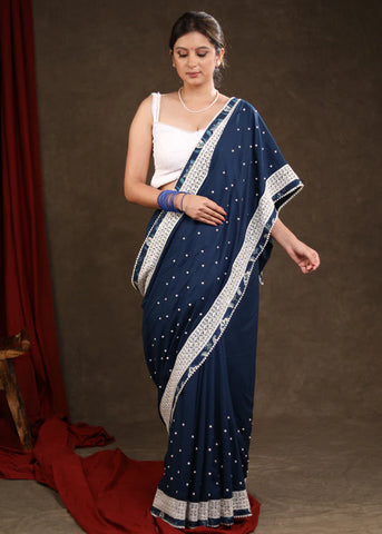 OCEAN BLUE RAYON SAREE HIGHLIGHTED WITH MOTI WORK & BEAUTIFUL LACE DETAILING