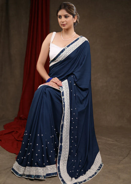 OCEAN BLUE RAYON SAREE HIGHLIGHTED WITH MOTI WORK & BEAUTIFUL LACE DETAILING