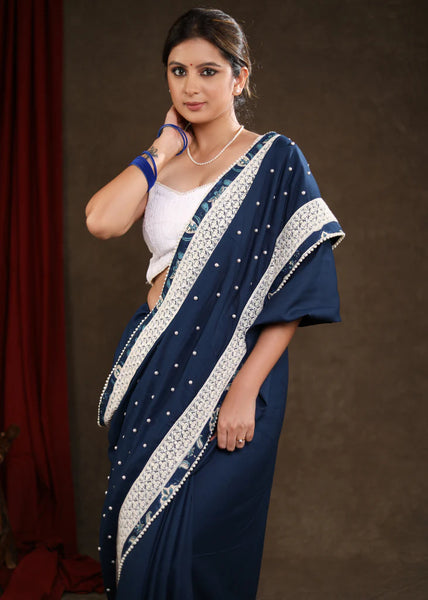 OCEAN BLUE RAYON SAREE HIGHLIGHTED WITH MOTI WORK & BEAUTIFUL LACE DETAILING