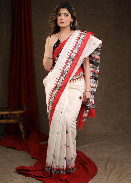 WHITE BLOCK PRINTED CHANDERI SAREE WITH TEMPLE BORDER & HAND EMBROIDERED GUJARATI STITCH