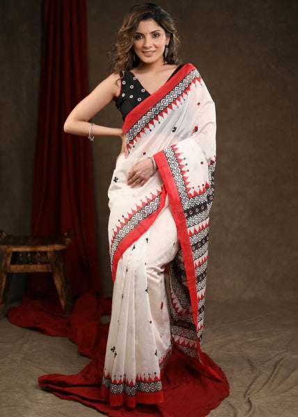 WHITE BLOCK PRINTED CHANDERI SAREE WITH TEMPLE BORDER & HAND EMBROIDERED GUJARATI STITCH