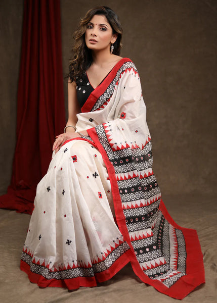 WHITE BLOCK PRINTED CHANDERI SAREE WITH TEMPLE BORDER & HAND EMBROIDERED GUJARATI STITCH