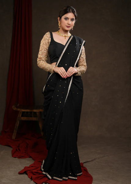 BLACK RAYON SAREE ADORNED WITH DELICATE GOLD HAND EMBROIDERY & LACE