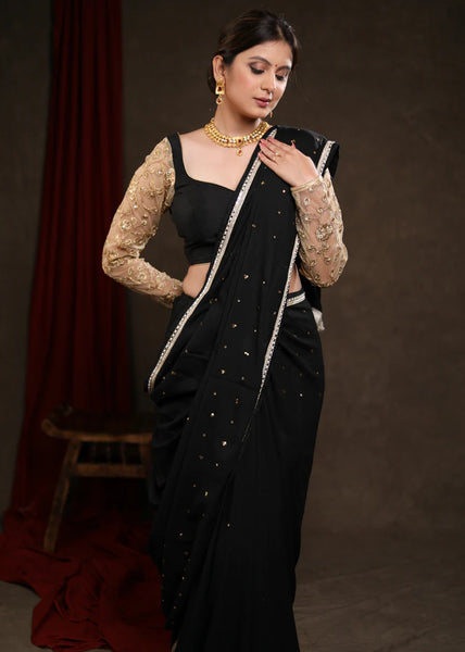 BLACK RAYON SAREE ADORNED WITH DELICATE GOLD HAND EMBROIDERY & LACE