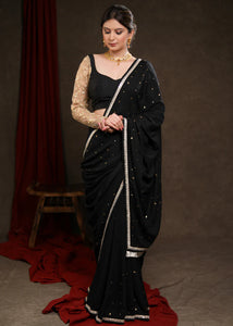 BLACK RAYON SAREE ADORNED WITH DELICATE GOLD HAND EMBROIDERY & LACE