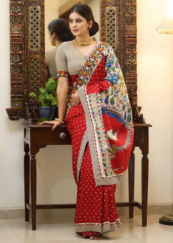 RED BANDHINI SAREE WITH ELEGANT HAND PAINTED MADHUBANI PALLU AND MIRROR WORK BORDER