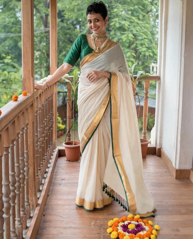 Elegant Off-white Mul Cotton Saree With Green And Gold Detailing