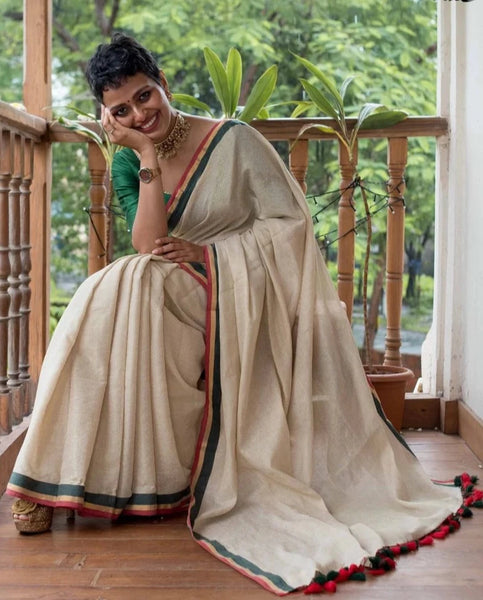 Off-white Cotton Zari Saree With Red, Gold and Green Embellishments