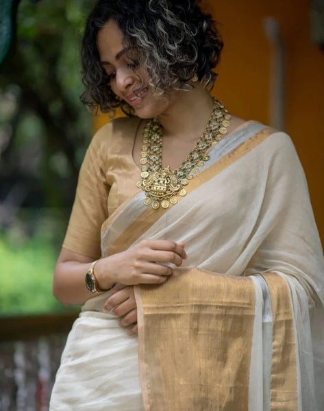 Off White Mulmul Cotton Tassel Saree With Golden Zari Border