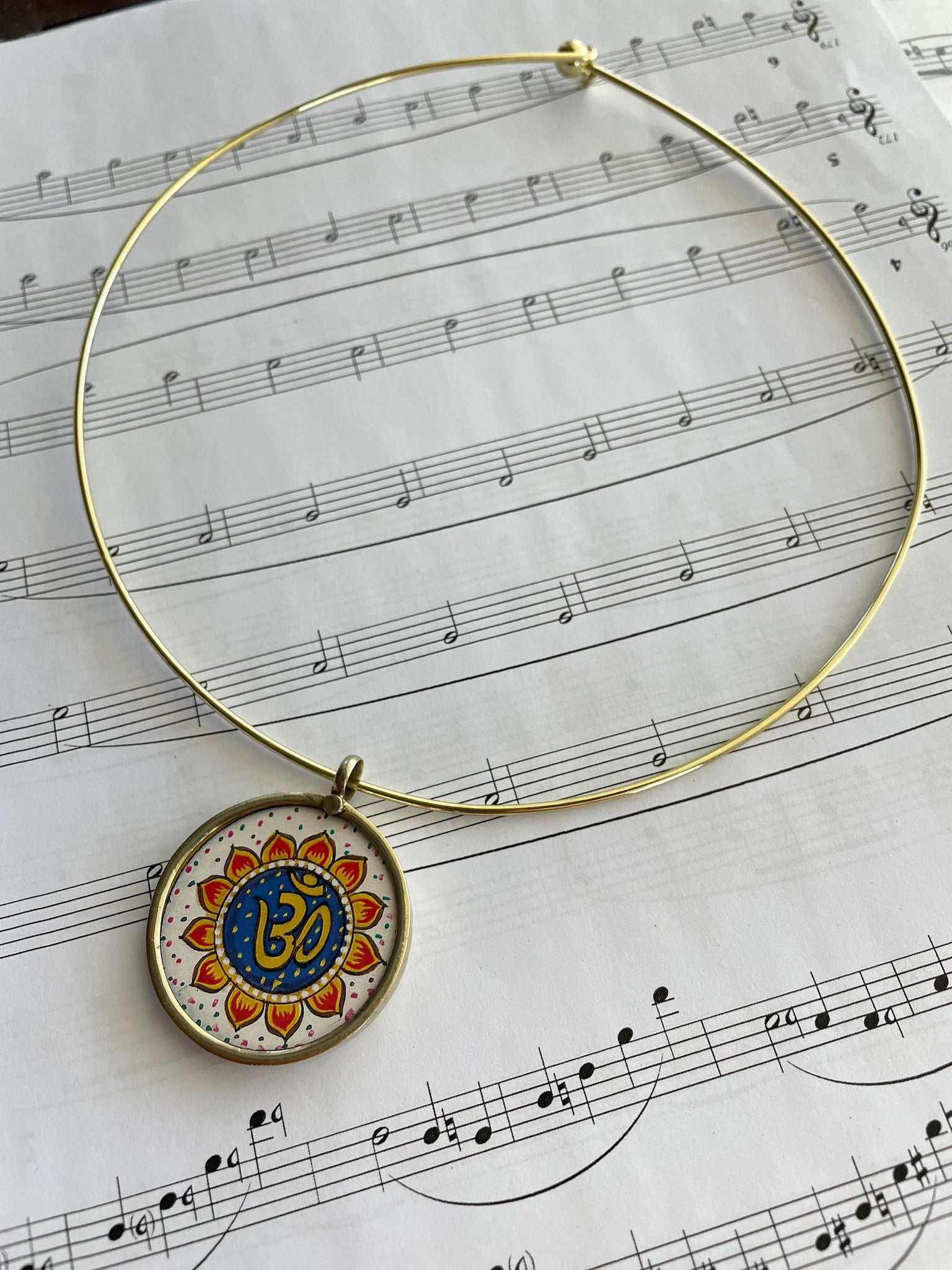 Om pendant Hasli Handpainted Om pendant in thin pipe necklace