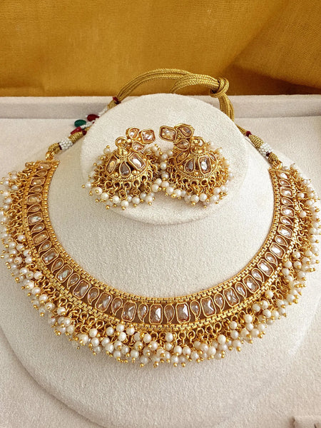 Gold Polki Stone Kundan Guttupuslu necklace