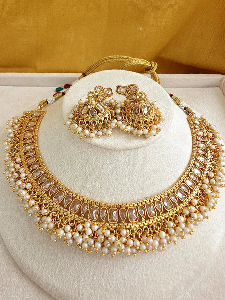 Gold Polki Stone Kundan Guttupuslu necklace