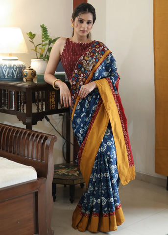 BLUE PRINTED SAREE GRACEFUL MADHUBANI PAINTED PALLU WITH MAROON AND MUSTARD BORDER