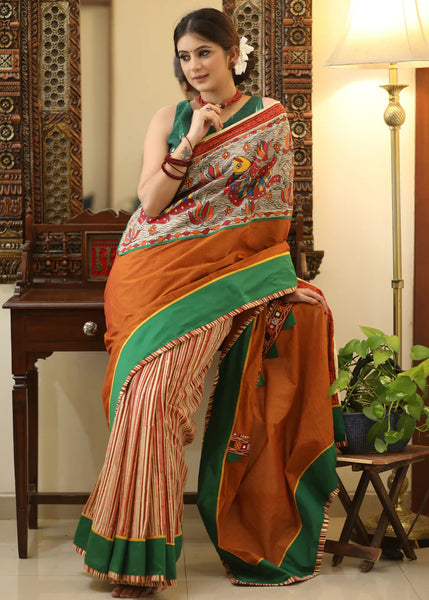 RUST COTTON SAREE WITH EXCLUSIVE HAND PAINTED MADHUBANI PALLU, LINE PLEATS & MIRROR WORK BORDER