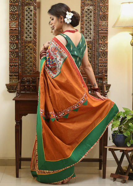 RUST COTTON SAREE WITH EXCLUSIVE HAND PAINTED MADHUBANI PALLU, LINE PLEATS & MIRROR WORK BORDER