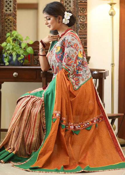 RUST COTTON SAREE WITH EXCLUSIVE HAND PAINTED MADHUBANI PALLU, LINE PLEATS & MIRROR WORK BORDER