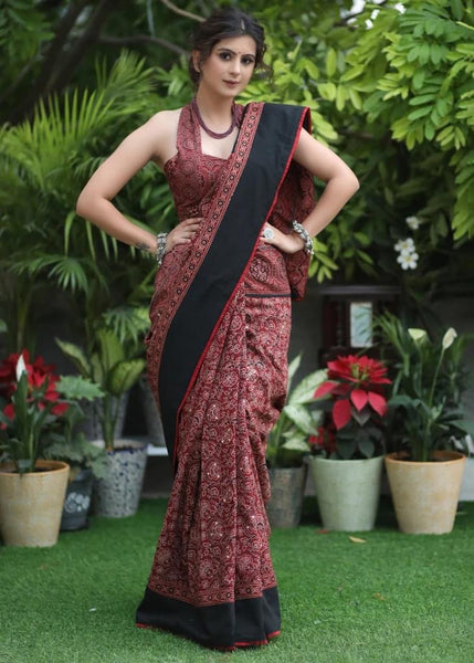 MAROON AJRAKH SAREE WITH BLACK BORDER & ACCENTUATED WITH STONE EMBELLISHMENT