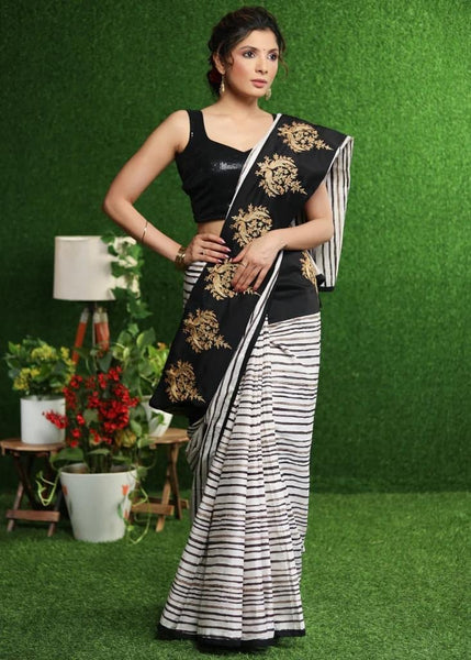 WHITE STRIPED SAREE WITH GOLD EMBROIDERED BORDER ON PALLU
