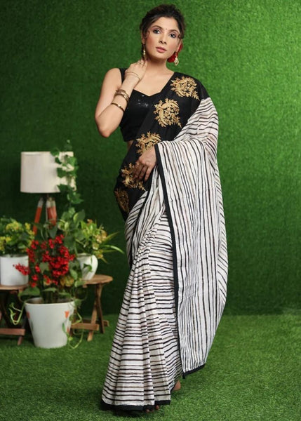 WHITE STRIPED SAREE WITH GOLD EMBROIDERED BORDER ON PALLU