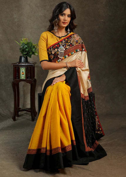 COTTON MUSTARD AND CREME SAREE WITH BLACK COTTON IKKAT PALLU AND KALAMKARI BORDER