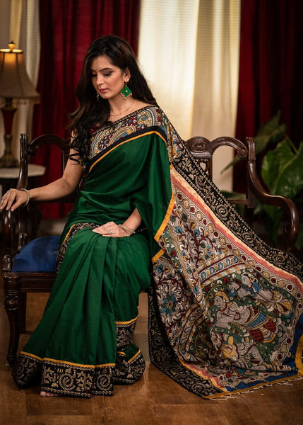 FOREST GREEN SATIN SAREE WITH HAND PAINTED KALAMKARI PALLU