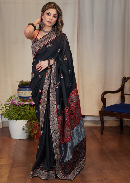 TISSUE MIX BLACK SAREE WITH ALL OVER EMBROIDERY AND AJRAKH COMBINATION PALLU