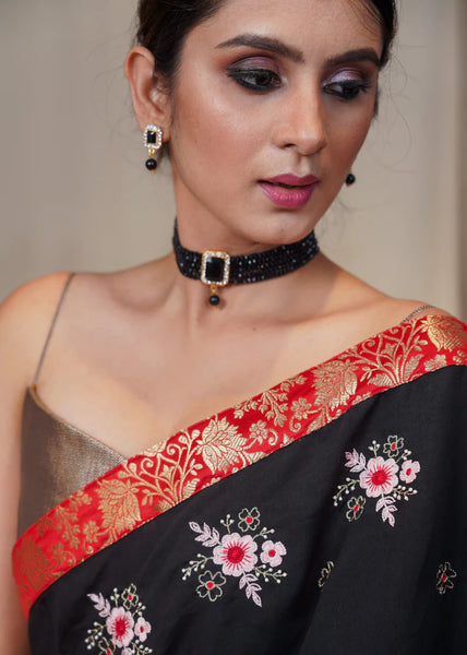 BLACK SEMI SILK WITH BEAUTIFUL OVERALL EMBROIDERY AND RED BENARASI BORDER