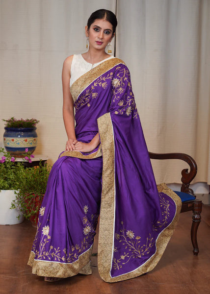 PURPLE ASSAM SILK SAREE WITH DELICATE EMBROIDERY AND GOLDEN BANARASI BORDER