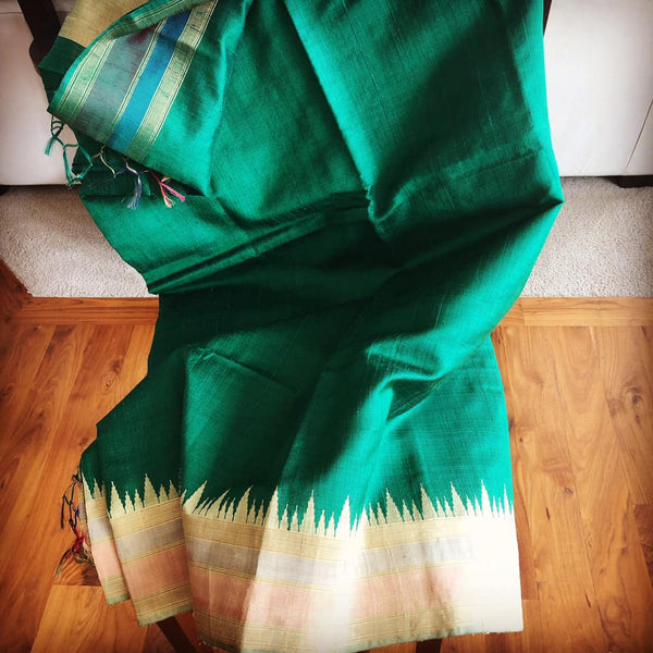 Pure Tussar Dupion Silk in Deep Green with Golden Multicolored Matte Temple Border with Golden Aachal with Tassels