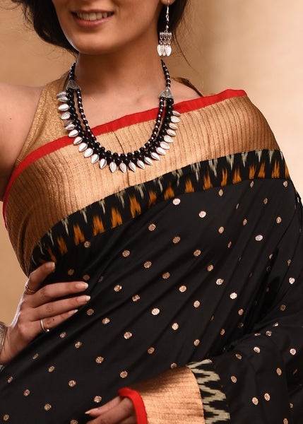 BLACK TAFETA SAREE WITH BUTA ALL OVER WITH IKAT BORDER & FRENCH CREPE PLEATS