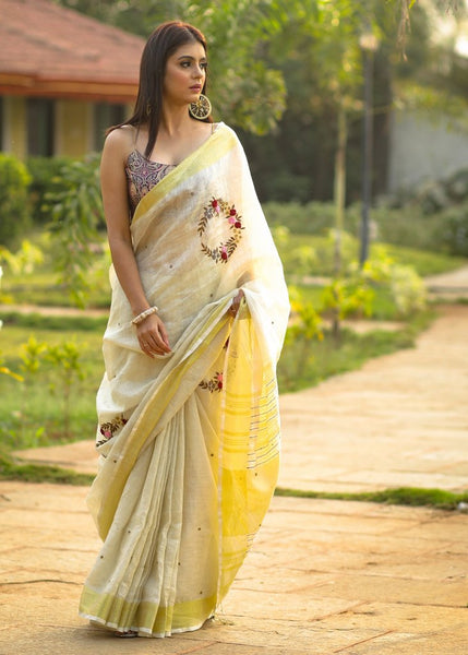 BEIGE PURE LINEN SAREE WITH INTRICATE EMBROIDERY & MIRROR WORK EMBELLISHMENTS