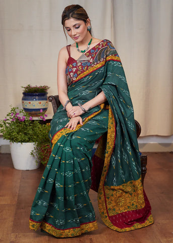 GREEN IKAT COTTON SAREE WITH EXCLUSIVE HAD PAINTED KALAMKARI BORDER