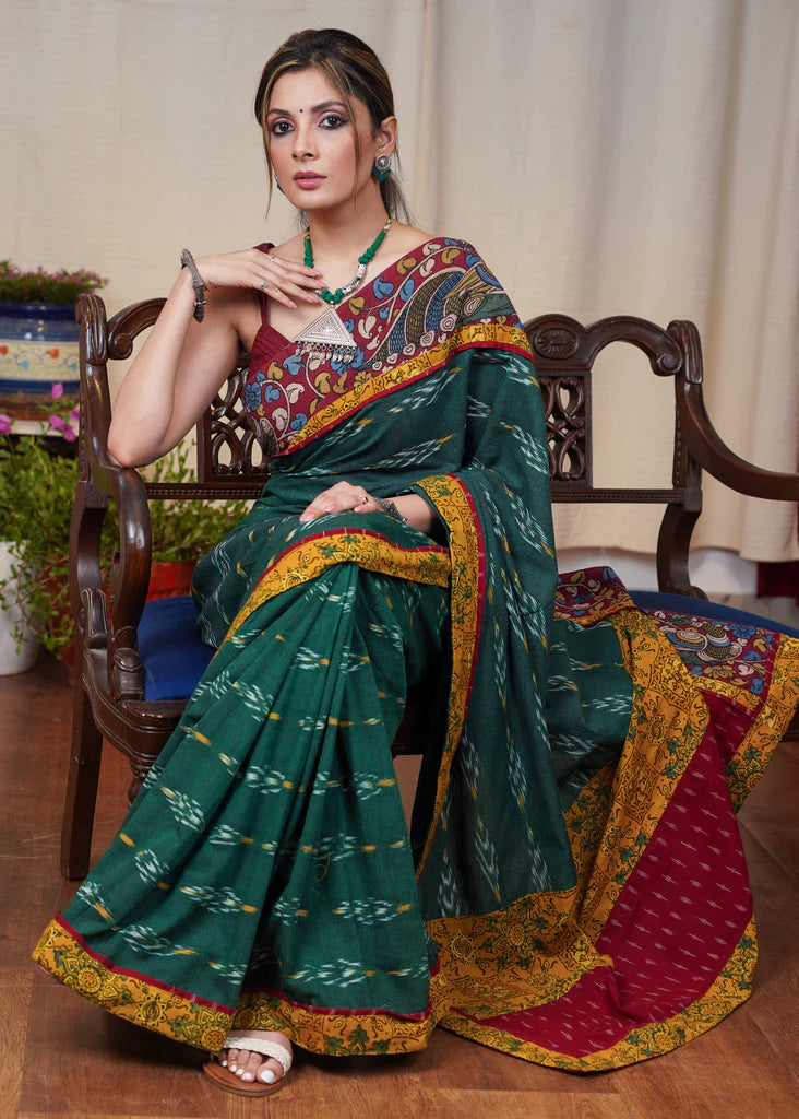 GREEN IKAT COTTON SAREE WITH EXCLUSIVE HAD PAINTED KALAMKARI