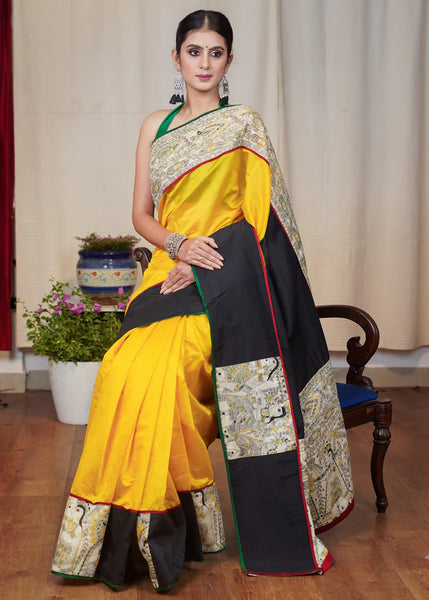 YELLOW CHANDERI SAREE WITH THE COMBINATION OF MADHUBANI PRINT AND BLACK COTTON SILK BORDER