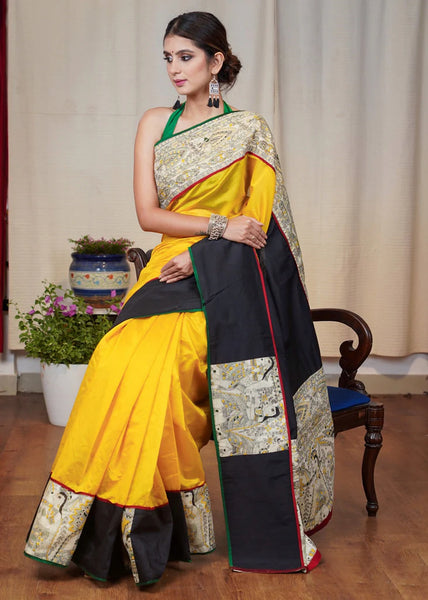 YELLOW CHANDERI SAREE WITH THE COMBINATION OF MADHUBANI PRINT AND BLACK COTTON SILK BORDER