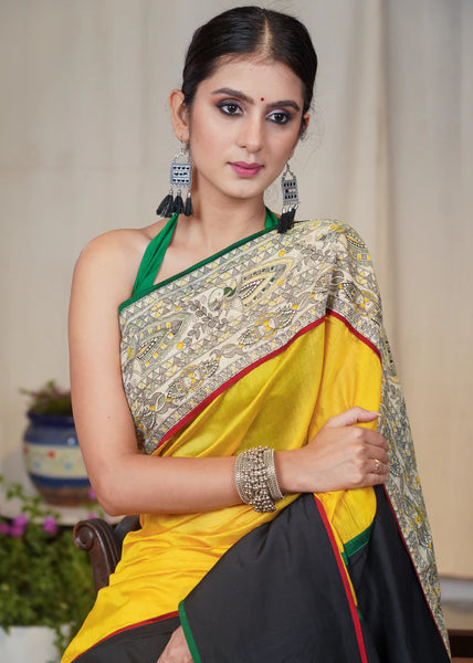 YELLOW CHANDERI SAREE WITH THE COMBINATION OF MADHUBANI PRINT AND BLACK COTTON SILK BORDER