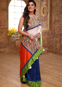 COMBINATION OF WHITE CHANDERI WITH BLUE & ORANGE COTTON SILK SAREE WITH HAND PAINTED MADHUBANI BORDER