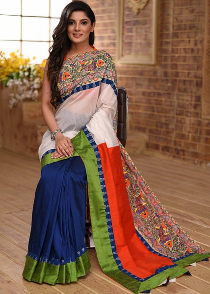 COMBINATION OF WHITE CHANDERI WITH BLUE & ORANGE COTTON SILK SAREE WITH HAND PAINTED MADHUBANI BORDER