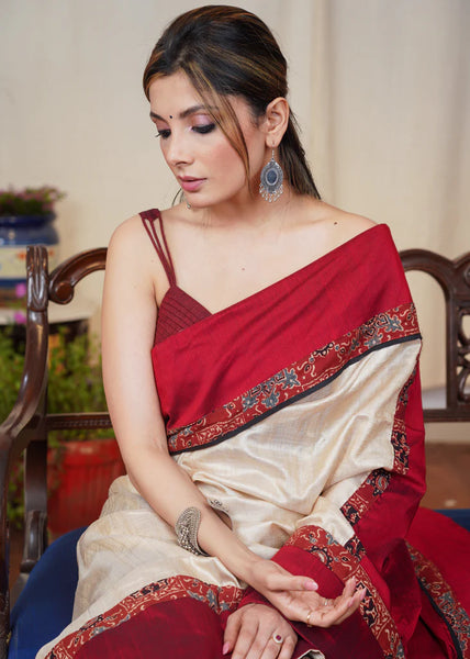 BEIGE TUSSAR SILK SAREE WITH MAROON COTTON SILK AND AJRAKH COMBINATION BORDER