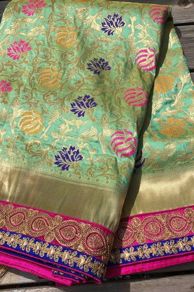 Pastel Green Pure Banarasi Brocade Silk Saree with Readymade Stitched Blouse.