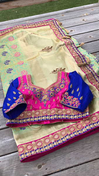 Pastel Green Pure Banarasi Brocade Silk Saree with Readymade Stitched Blouse.