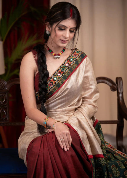 BEIGE TUSSAR SILK SAREE WITH MAROON COTTON SILK AND AJRAKH COMBINATION BORDER