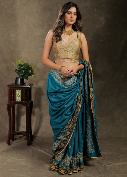Embroidered Teal Blue Rayon Saree With Ajrakh Border